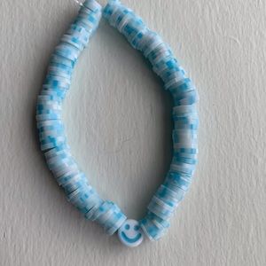 Handmade clay bead blue/white smile bead stretchy